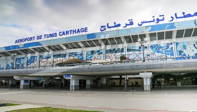 The terminal front of Tunis-Carthage airport with its name in Arabic and French, file photo