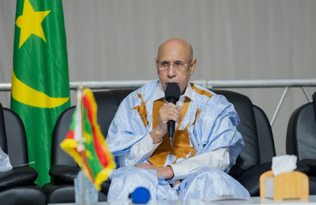 President Mohamed Ould Cheikh El Ghazouani speaks at an official meeting beside the Mauritanian flag, file photo