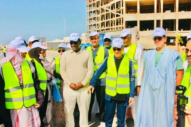 Officials and activists of the El Insaf party in safety vests at the launch of a clean-up campaign in Nouakchott
