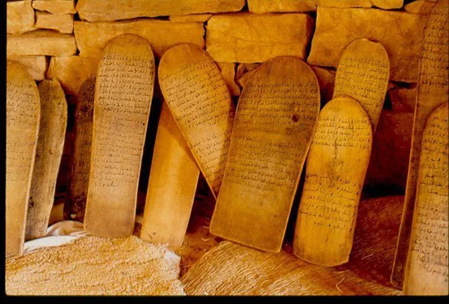 Traditional wooden tablets from Mauritanian Quranic schools covered in Arabic writing