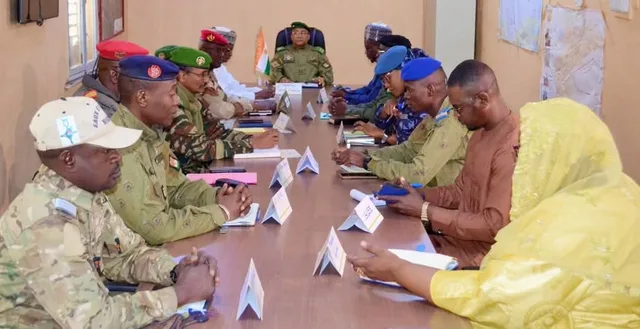 Nigerien military and security officials around a meeting table in Agadez