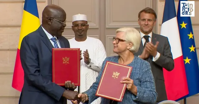 French and Chadian officials at a signing ceremony