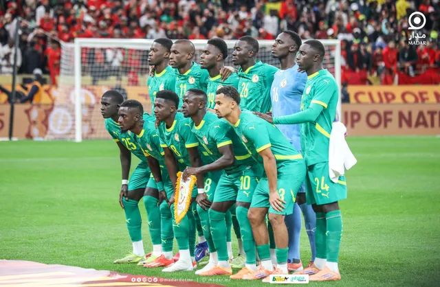 Senegal players in green shirts posing for a team photo before an Africa Cup of Nations match, file photo