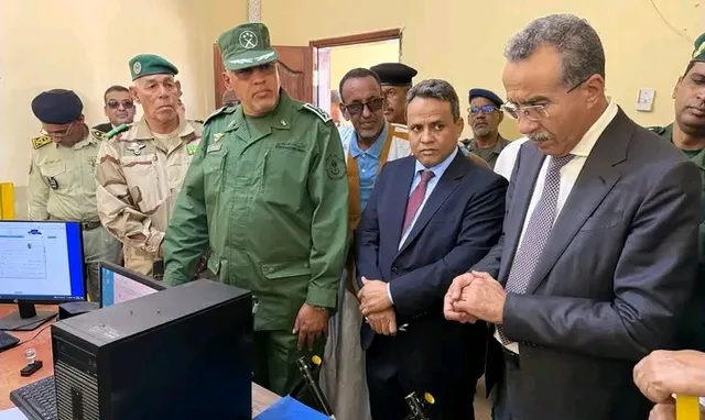 Archive photo from Madar's library showing officials inspecting the PK55 border post