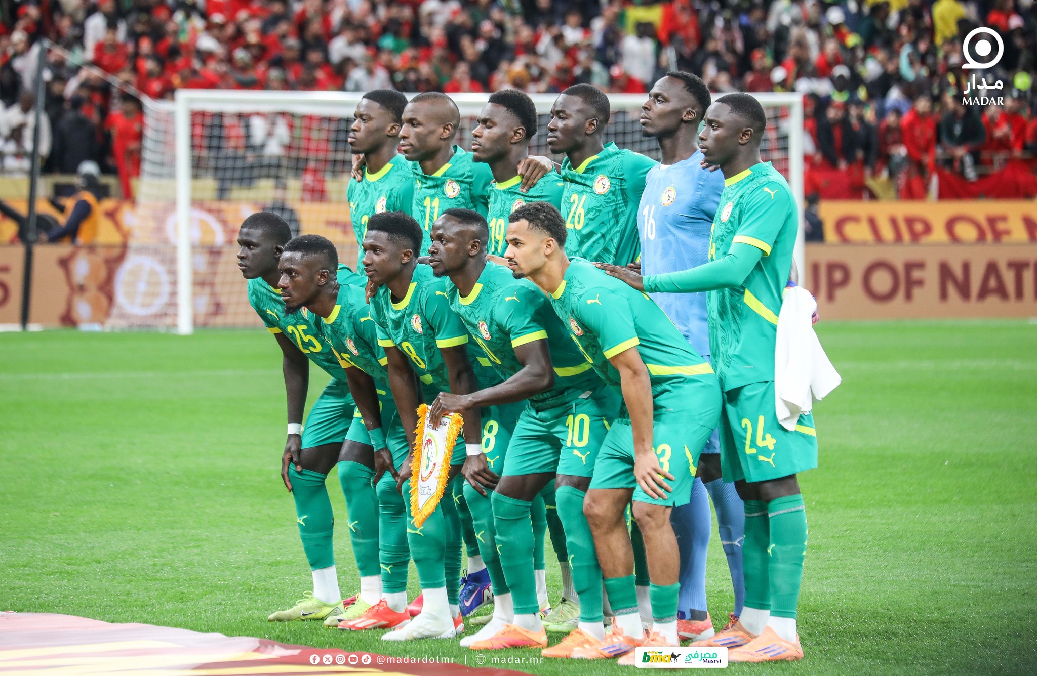 Senegal players in green shirts posing for a team photo before an Africa Cup of Nations match, file photo