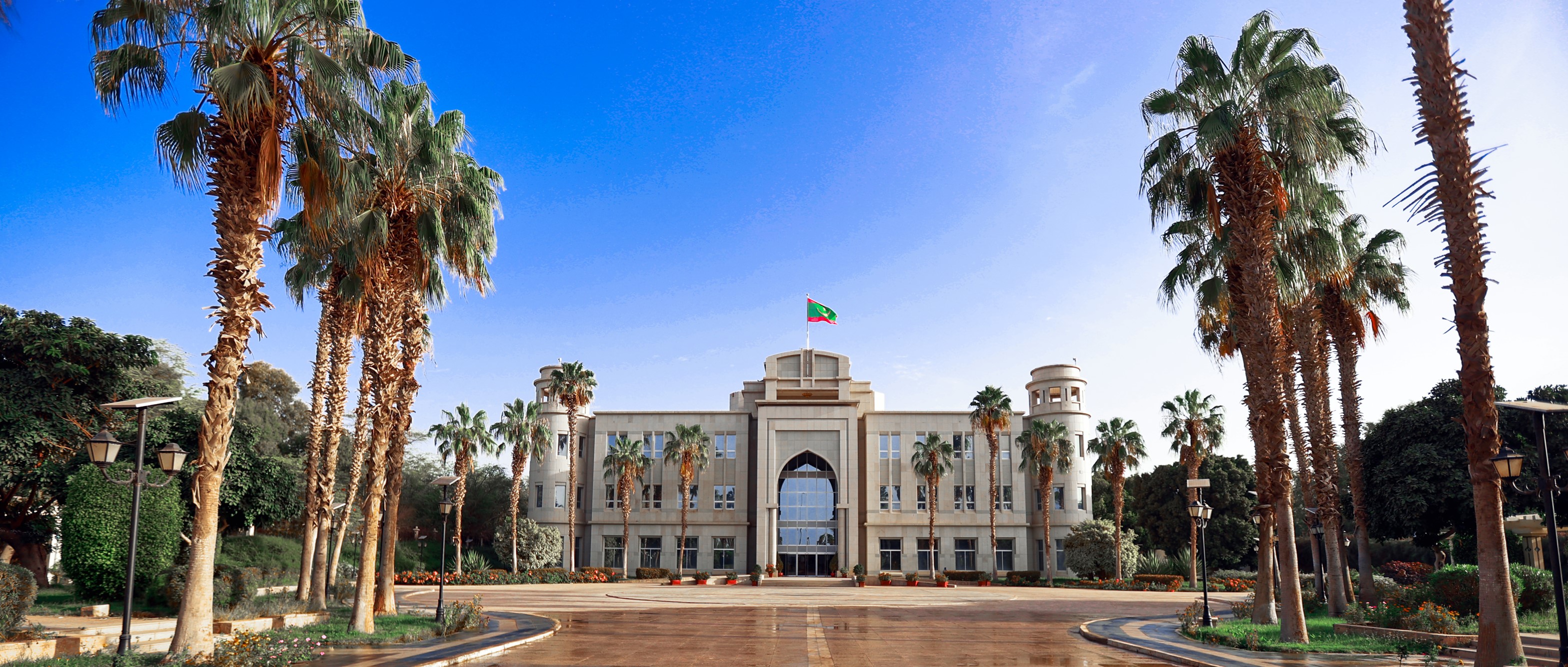 The Presidential Palace in Nouakchott surrounded by palm trees