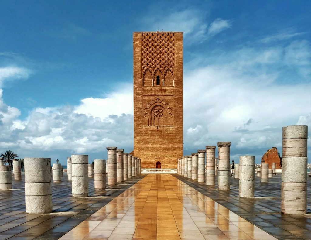Hassan Tower and the columns of its esplanade in Rabat under a cloudy sky