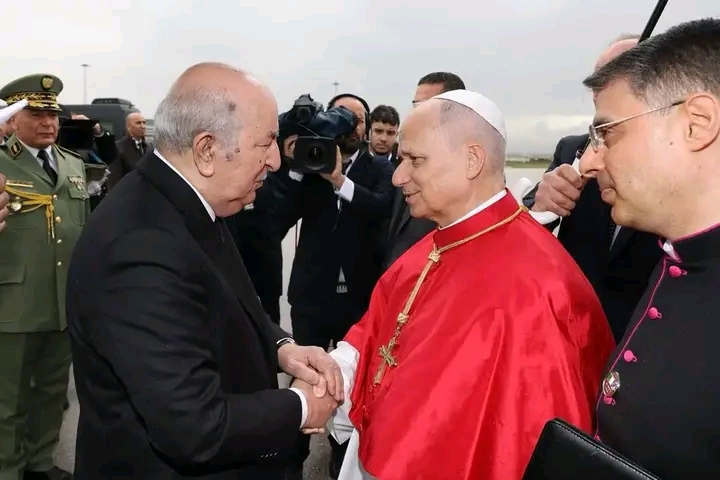 Algerian President Abdelmadjid Tebboune shakes hands with Pope Leo XIV on his arrival in Algeria in April 2026, file photo