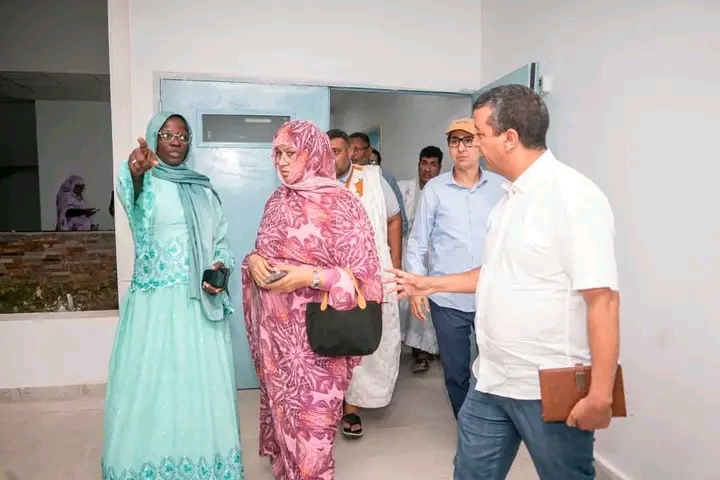 The health minister visits a new health centre with officials