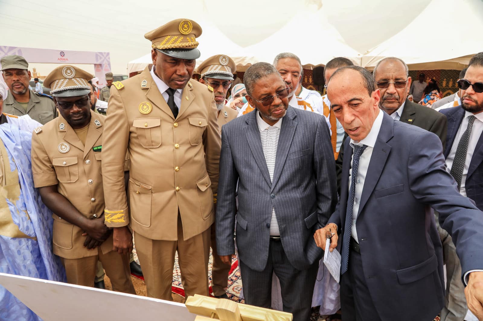 Civilian and military officials at the foundation-stone ceremony for a temporary waste dump in Nouakchott