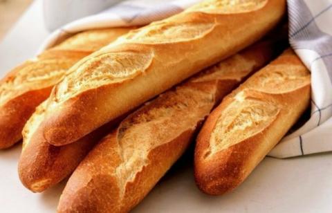 Golden baguettes wrapped in a cloth, file photo