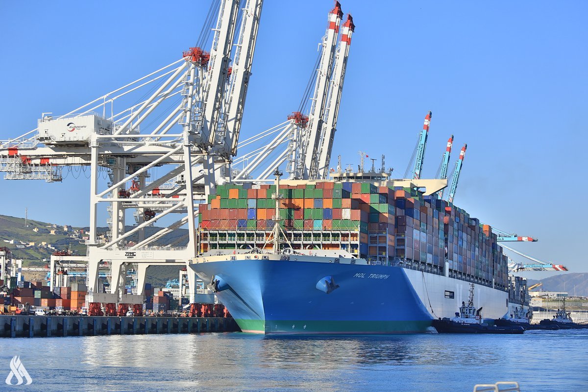 A container ship docked under the cranes of Tanger Med port