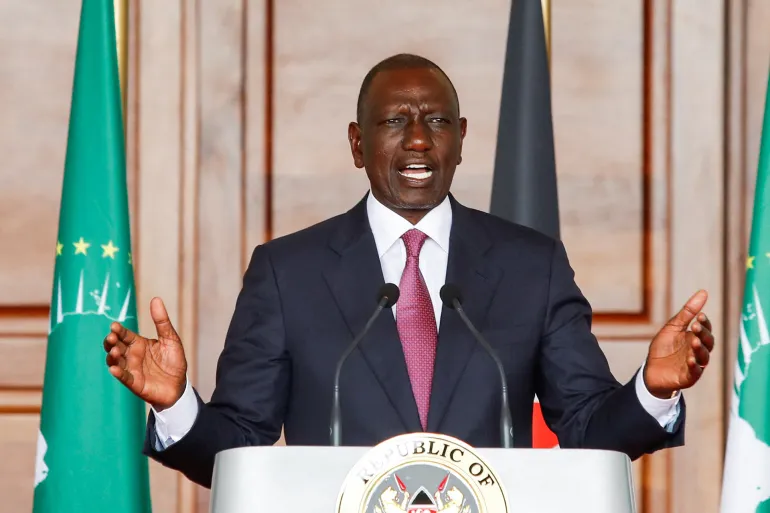 Kenyan President William Ruto speaks behind a lectern bearing the Republic's emblem, file photo