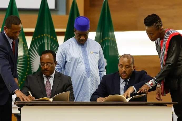 Ethiopian government and TPLF representatives sign the Pretoria peace agreement alongside African Union mediators