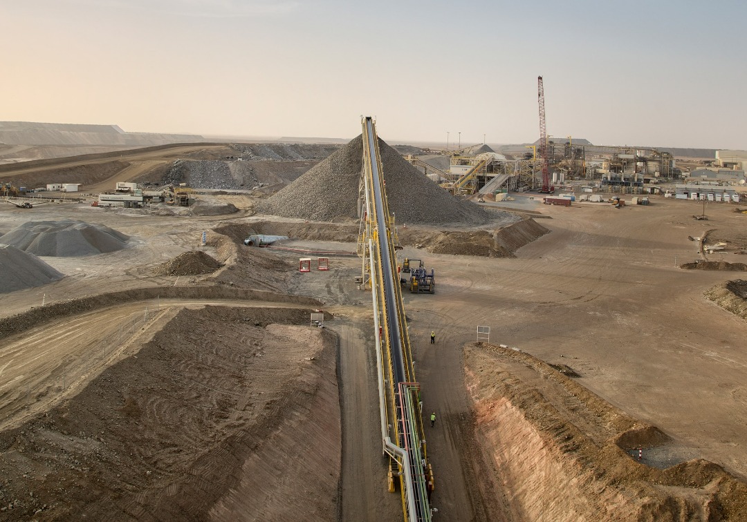 Aerial view of the conveyor, ore stockpiles and plant at the Tasiast mine